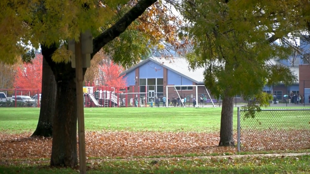 Elementary students play in an outdoor playground at Cesar Chavez Elementary school.